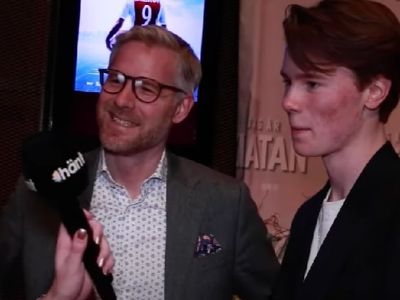 Both Edvin Ryding and Jonas Ryding are looking at the interviewer.